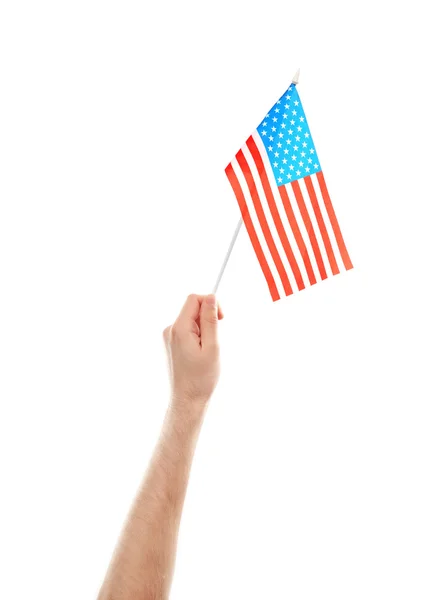 Mano femenina sosteniendo bandera americana — Foto de Stock