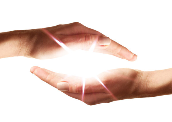 Female hands holding light