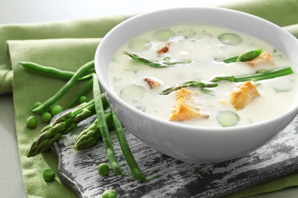 Asparagus soup with crackers — Stock Image Asparagus soup with crackers Stock Photo