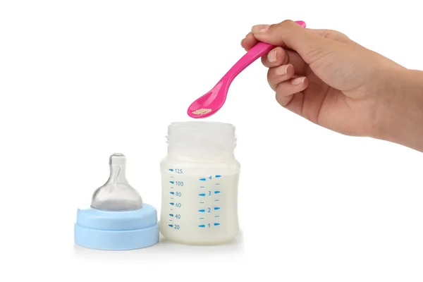 Adding medicine to baby milk formula — Stock Photo, Image