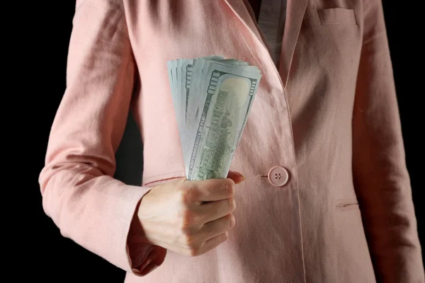 Woman with money on black — Stock Photo, Image