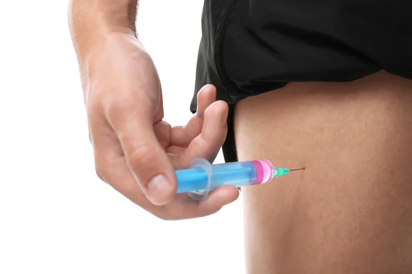 Sportsman injecting himself with steroids — Stock Photo, Image