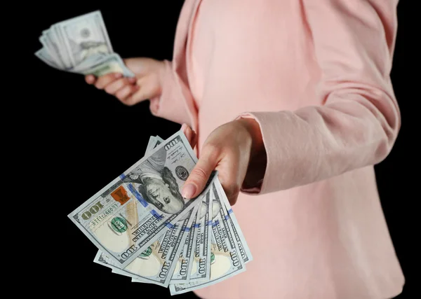 Woman with money on black — Stock Photo, Image