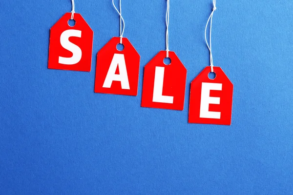 Sale labels on color — Stock Photo, Image
