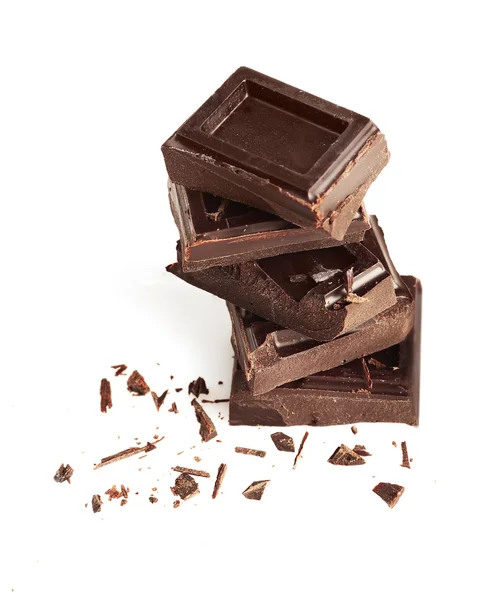 Pedaços de chocolate empilhados — Fotografia de Stock