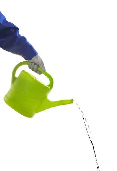 Hand holding watering can — Stock Photo, Image