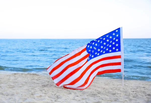 American flag on beach — Stock Photo, Image