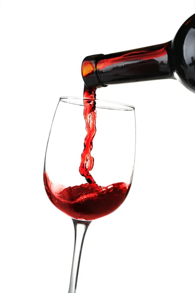 Red wine pouring into glass — Stock Photo, Image