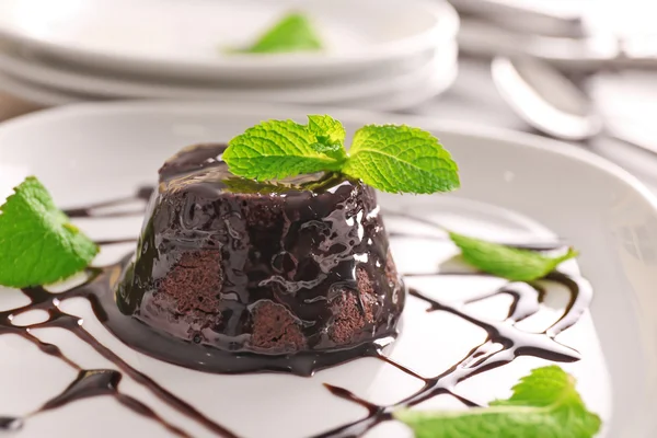 Chocolate fondant cake with mint — Stock Photo, Image