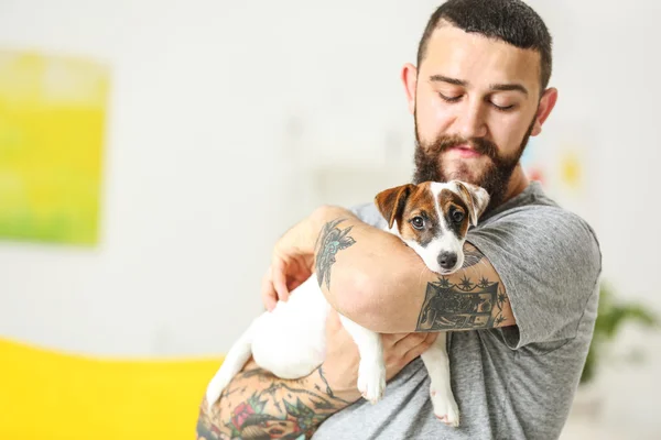 Handsome man with dog — Stock Photo, Image