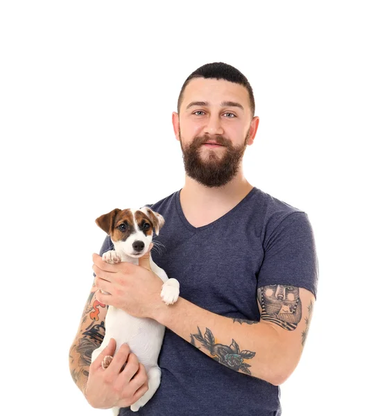 Красивый мужчина с собакой — стоковое фото