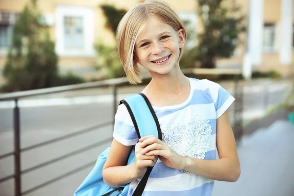 Cute schoolgirl on street — Stock Photo, Image