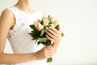 Bride holding wedding bouquet clipart
