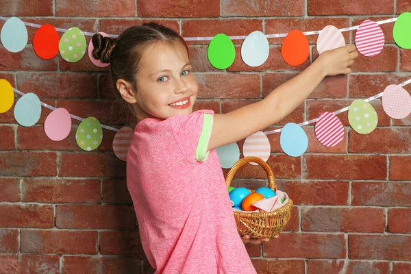 Cute girl with Easter eggs — Stock Photo, Image