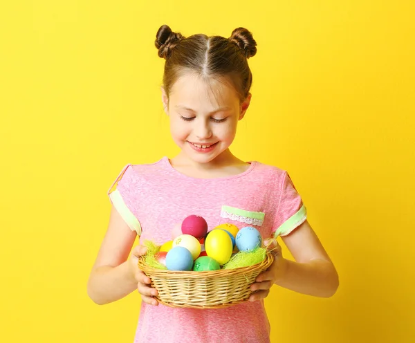 Cute girl with Easter eggs — Stock Photo, Image