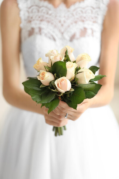 Bride holding wedding bouquet