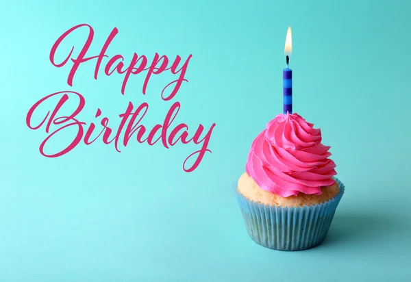 Birthday cupcake on blue — Stock Photo, Image