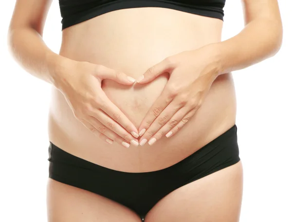 Mujer embarazada en blanco — Foto de Stock