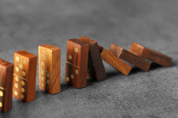 Wooden dominoes on grey table — Stock Photo, Image