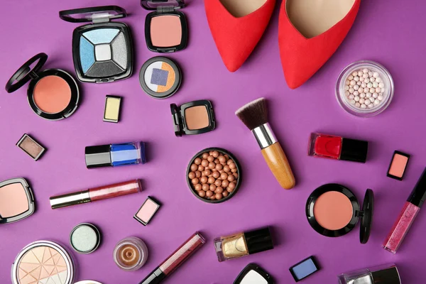 Makeup products, brushes and female shoes — Stock Photo, Image