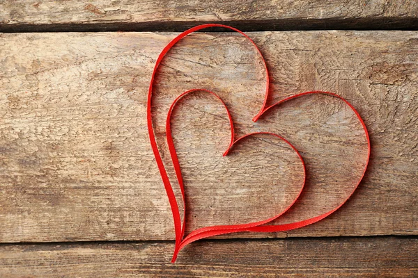 Two hearts made of red ribbon — Stock Photo, Image