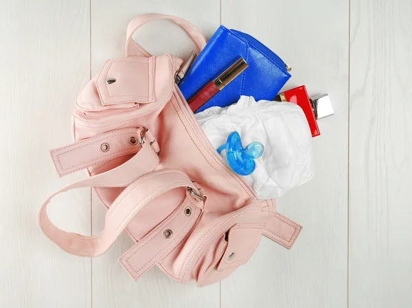 Mothers bag with accessories — Stock Photo, Image