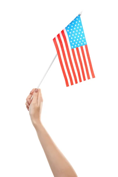 Mano femenina sosteniendo bandera americana — Foto de Stock
