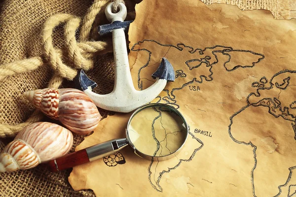 Magnifier, anchor and seashells — Stock Photo, Image