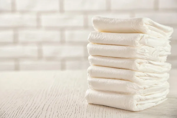 Pile of diapers on the table — Stock Photo, Image