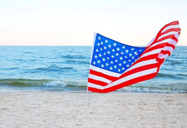 American flag on beach — Stock Photo, Image