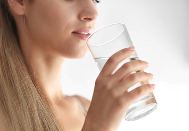 Girl drinking water  clipart