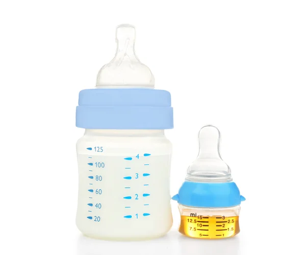 Feeding bottle and bottle with medicine — Stock Photo, Image