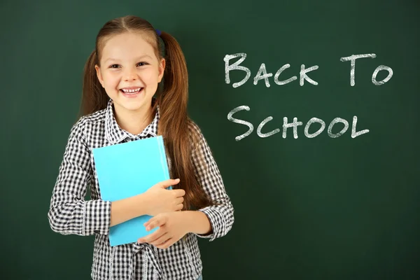 School Concept Cute Girl Holding Book Blackboard Background Text Back — Stock Photo, Image