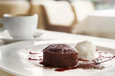 Chocolate cake with cup of coffee 