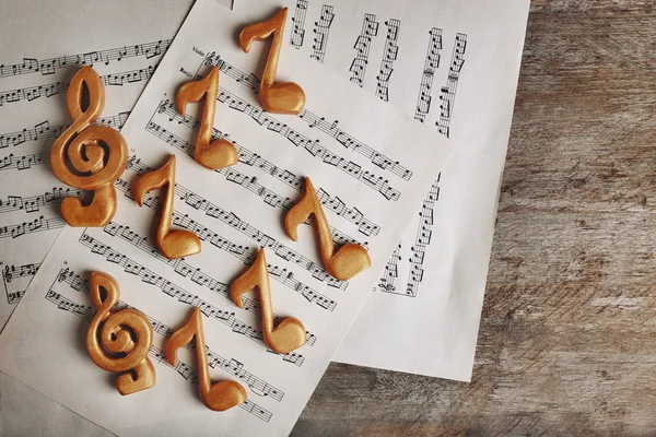 Music sheets with golden notes — Stock Photo, Image
