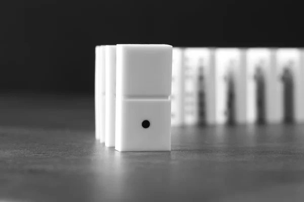 Line of dominoes standing — Stock Photo, Image