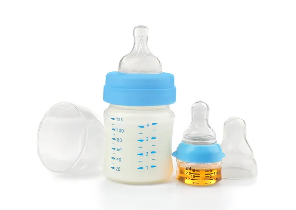 Feeding bottle and bottle with medicine — Stock Photo, Image