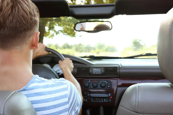 Young Man Driving Car Stock Picture