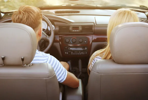 Young couple in car