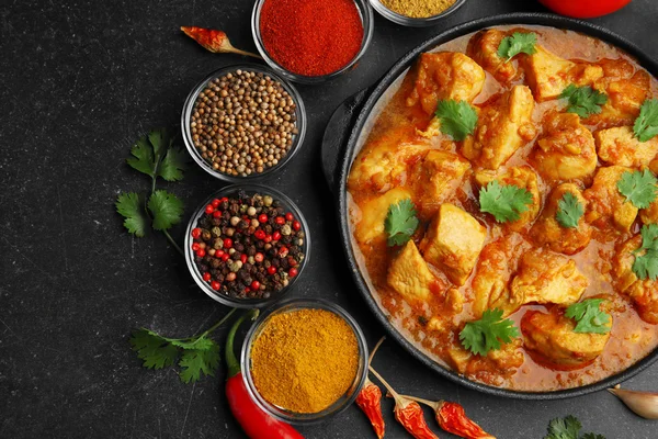 Chicken curry with different spices