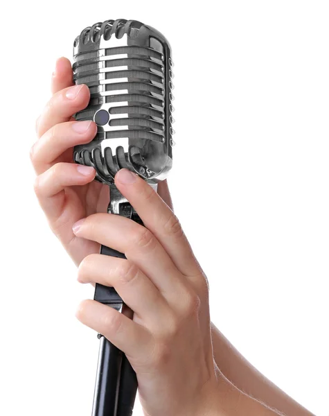 Female hands with vintage microphone — Stock Photo, Image