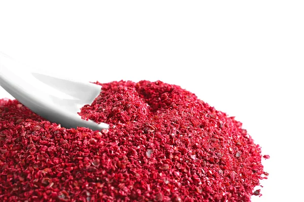 Heap of sumac with spoon — Stock Photo, Image