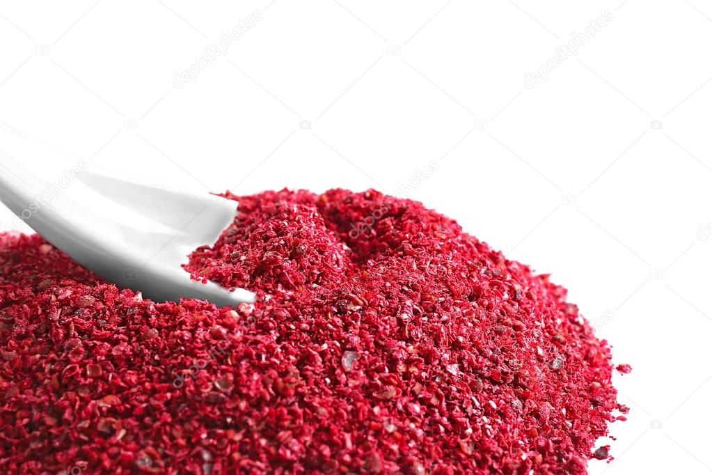 Heap of sumac with spoon 