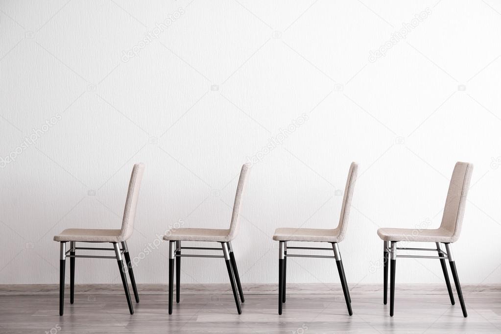 Set of chairs in light room