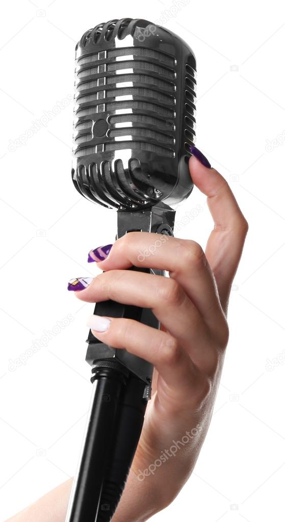 hand with vintage  microphone 