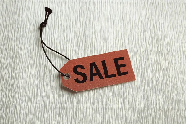 Sale label on background — Stock Photo, Image