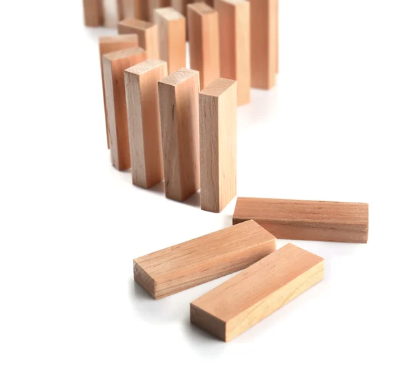 Wooden dominoes on light background — Stock Photo, Image