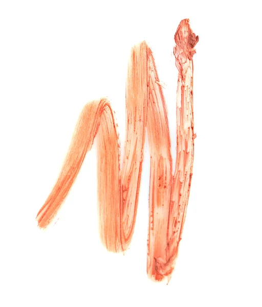 Сливочная текстура помады, выделенная на белом — стоковое фото