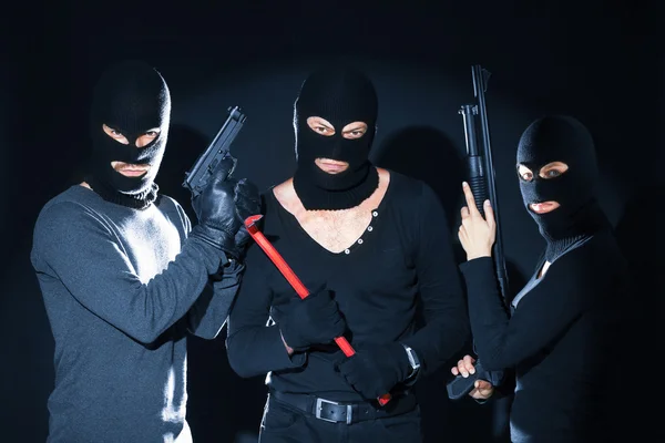 Ozbrojení Zloději Kukly Černém Pozadí — Stock fotografie
