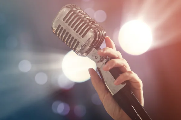 Hand with vintage  microphone — Stock Photo, Image